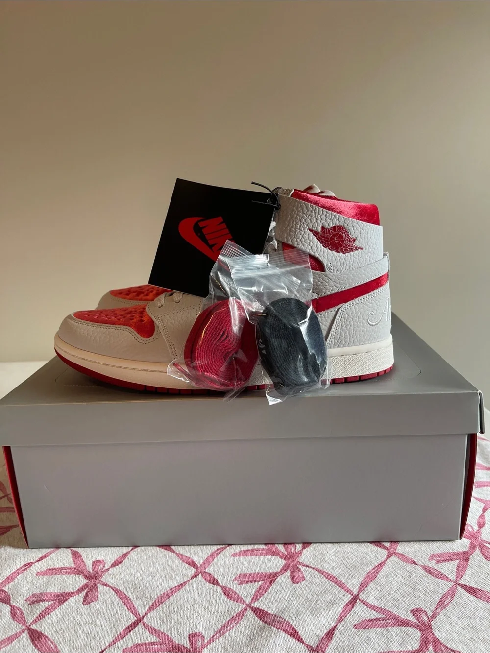 Jordan Women’s High-Top Sneakers in White and Red